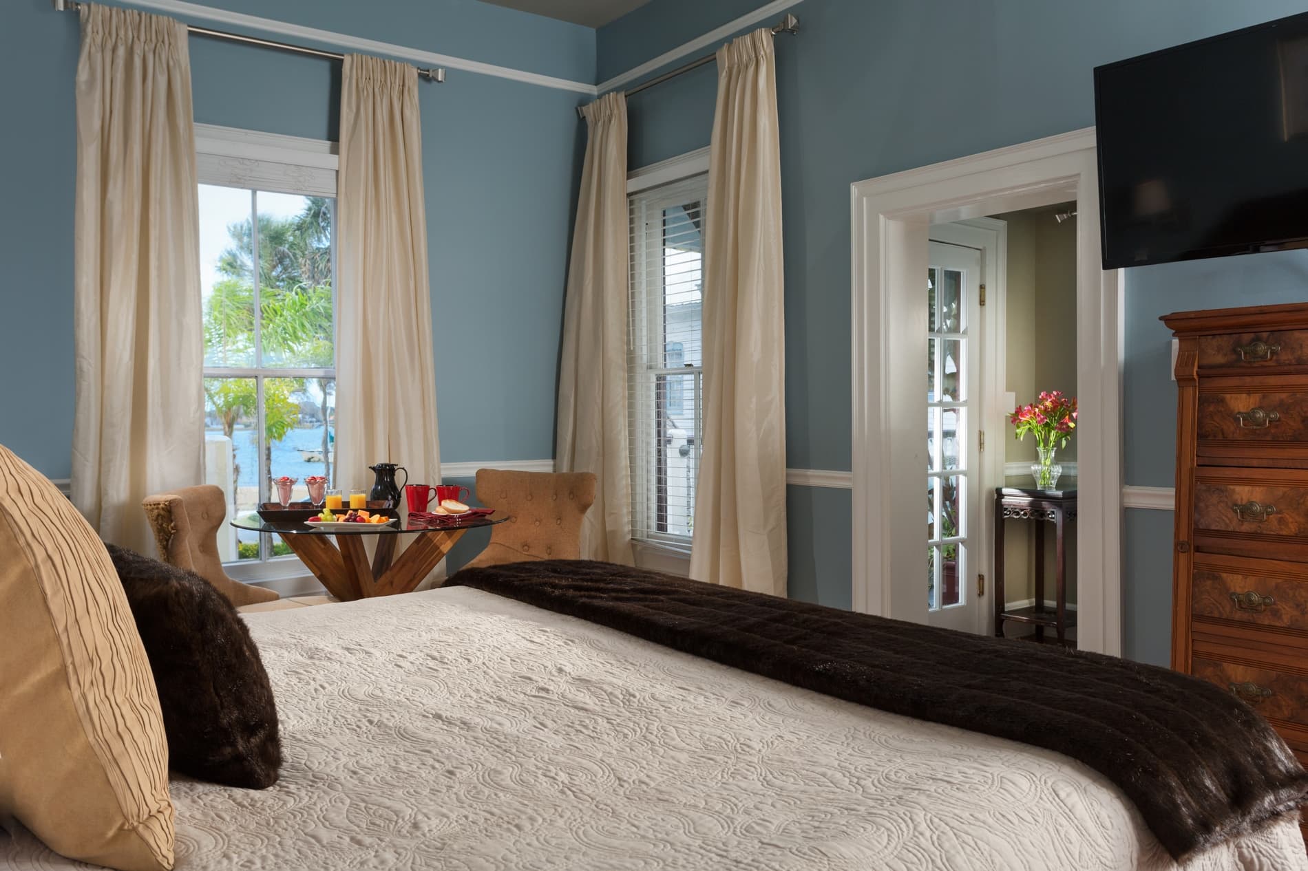Blue bedroom with water view