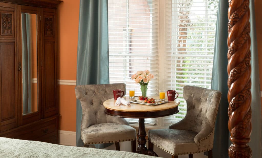 sitting area with breakfast on small table