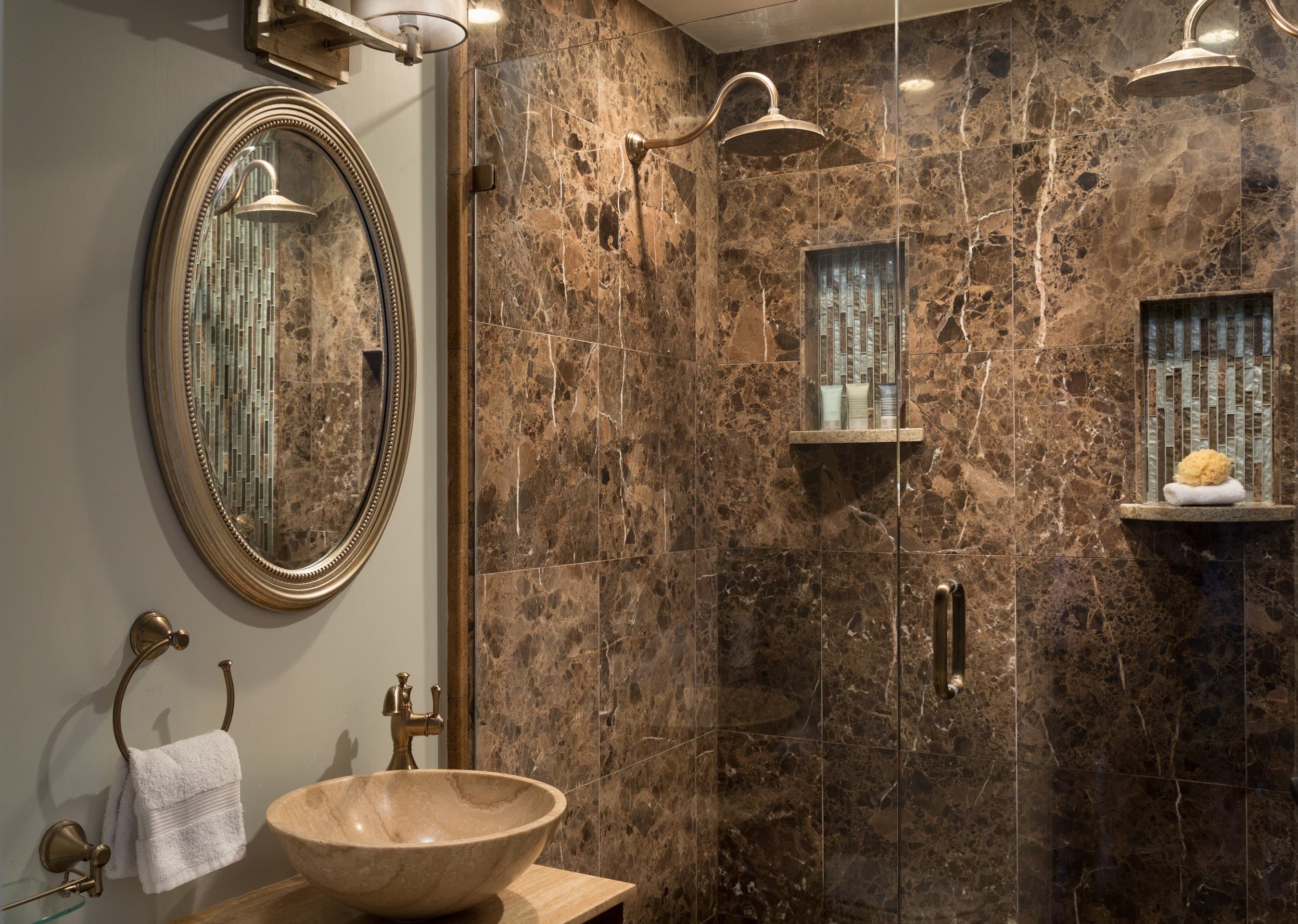 brown marble bath with vessel sink