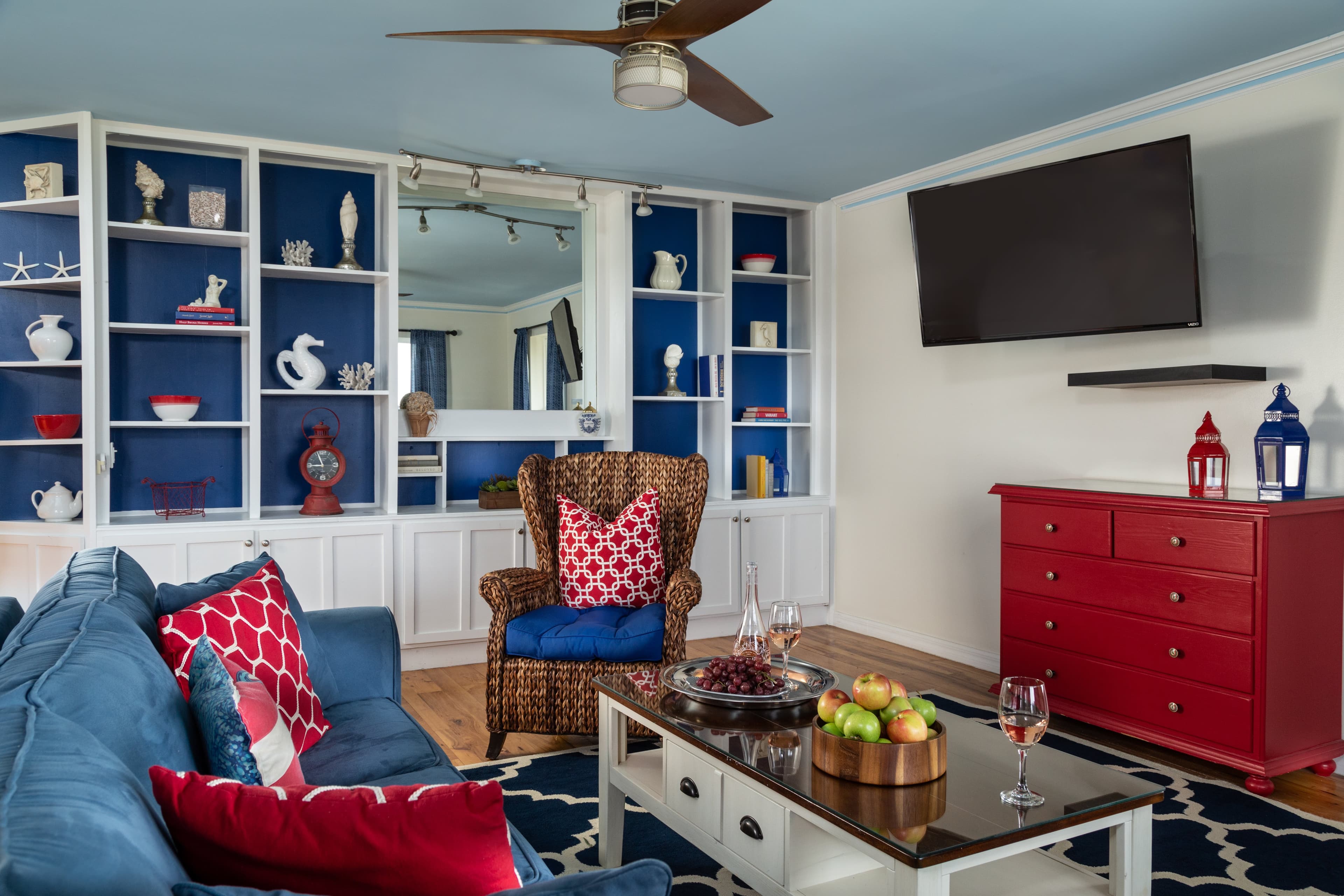 living room with television and built in shelves