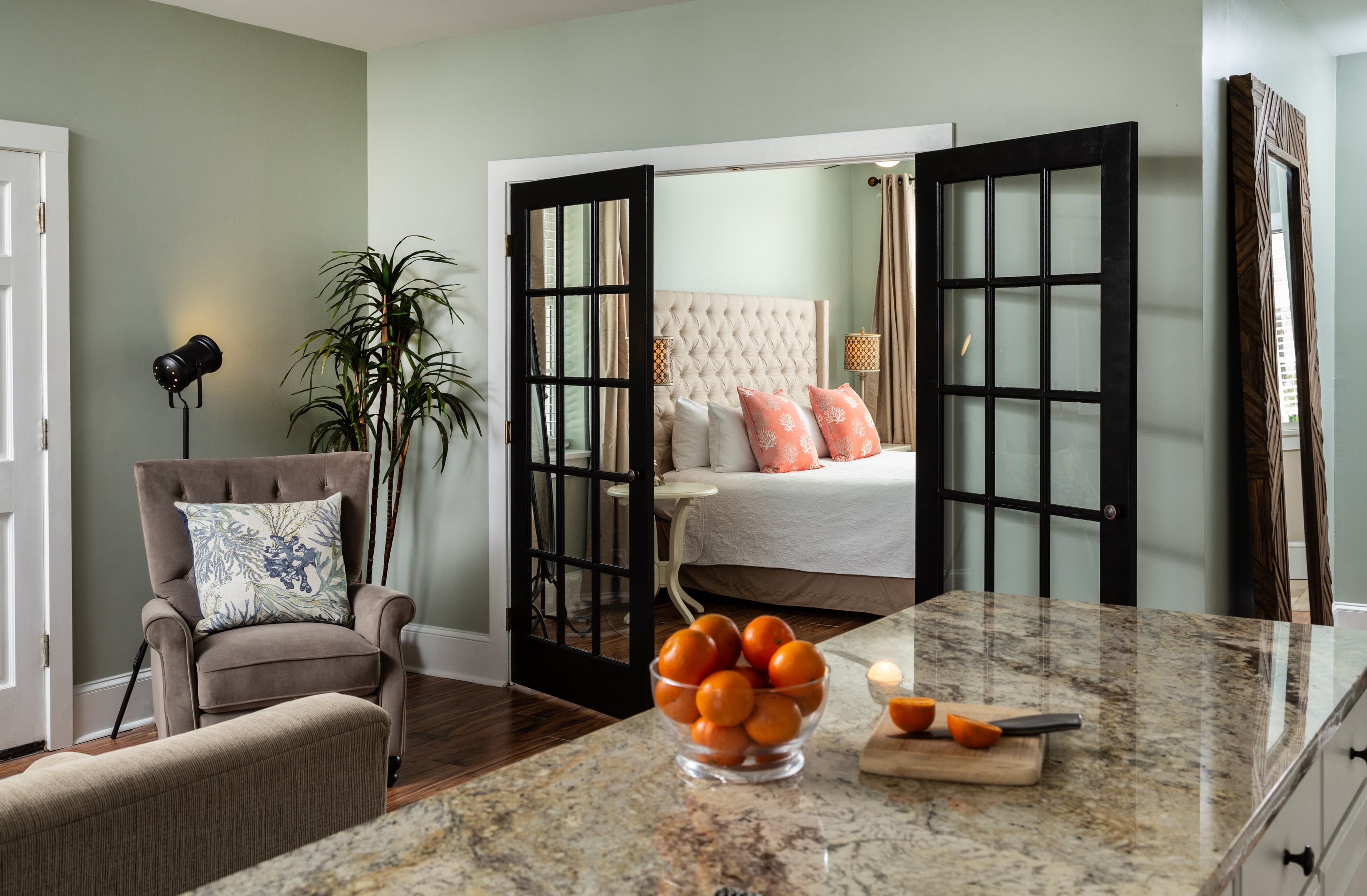 bedroom behind black french doors