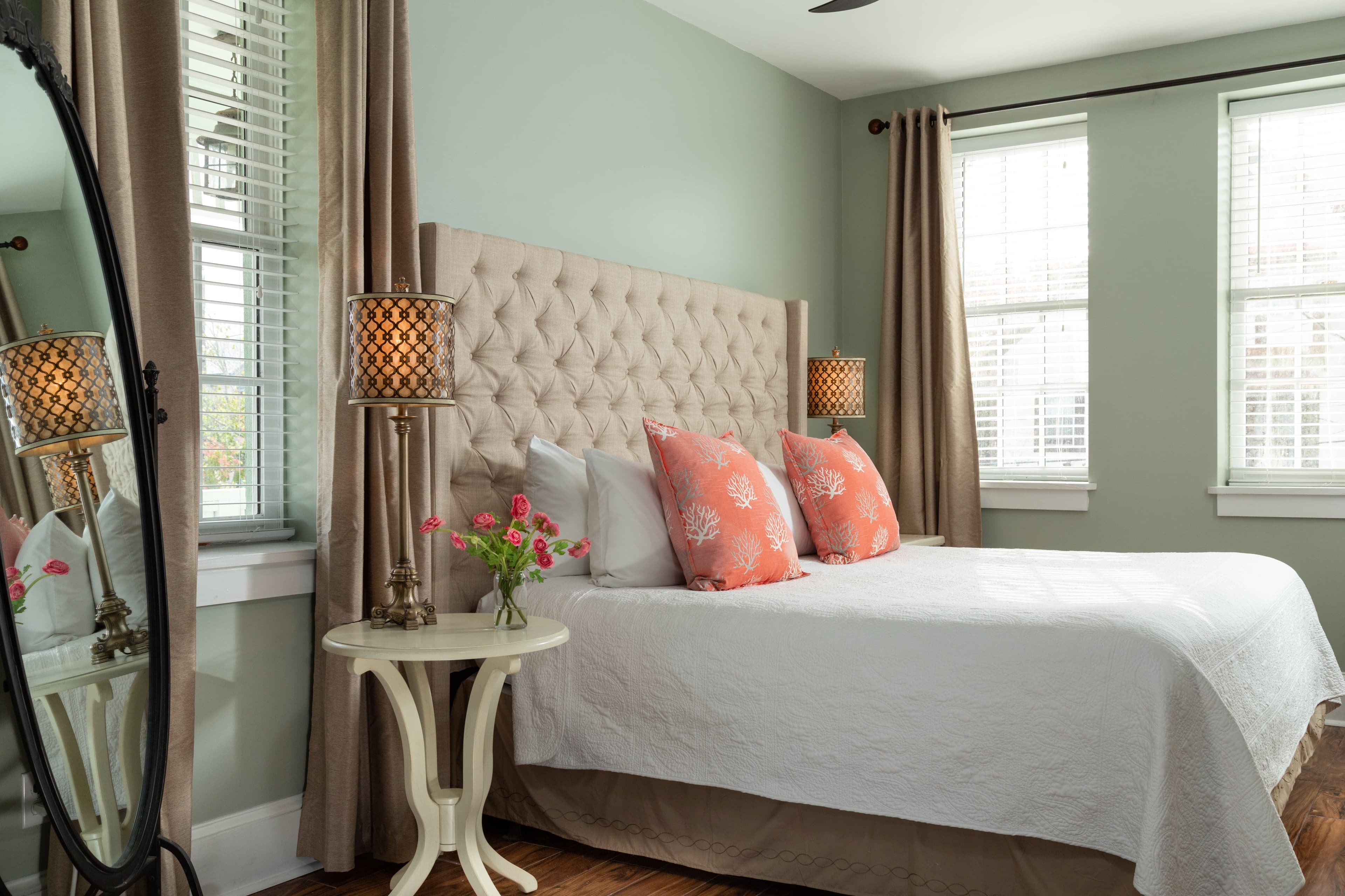 upholstered bed and mirror