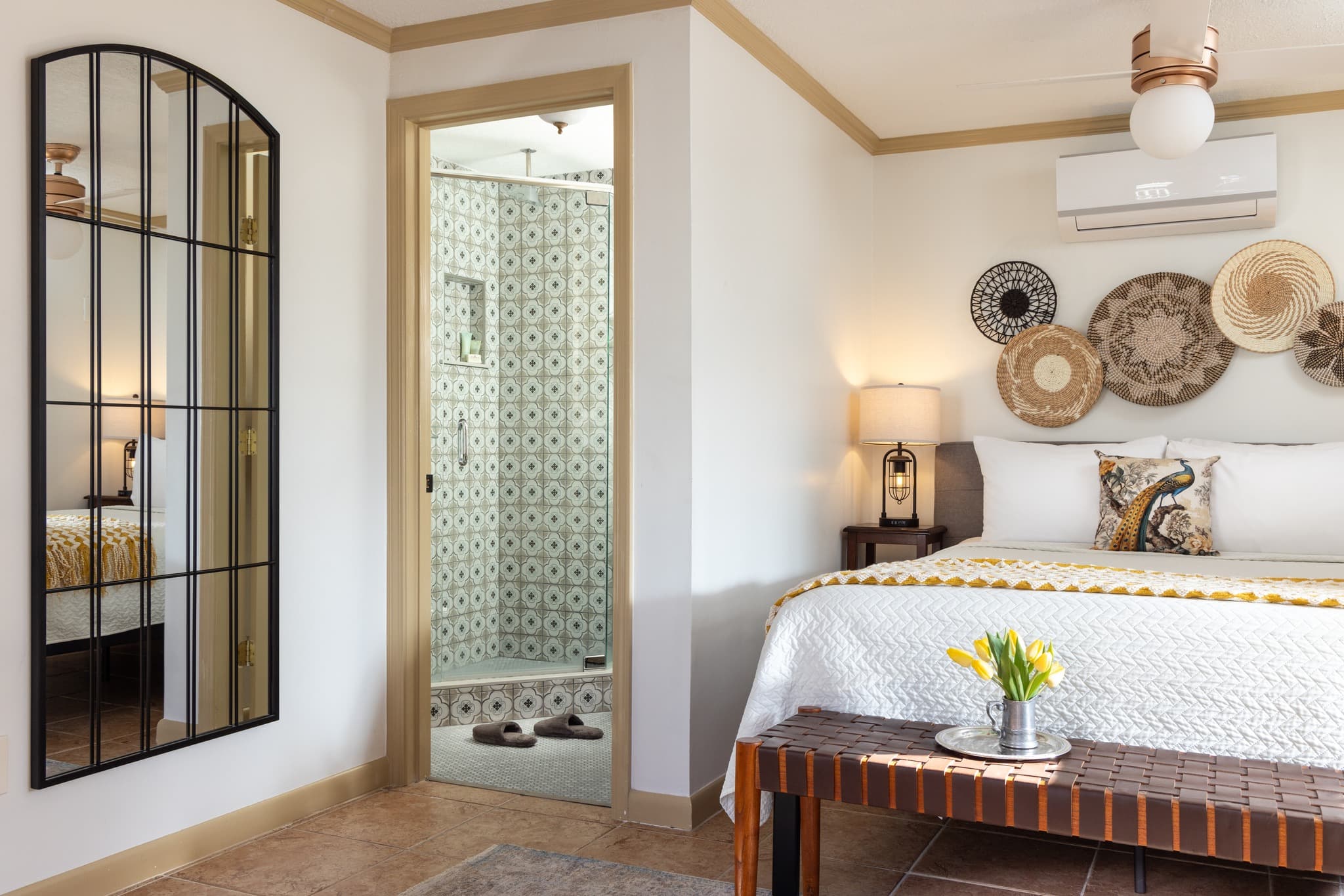 queen bed and private bath with shower