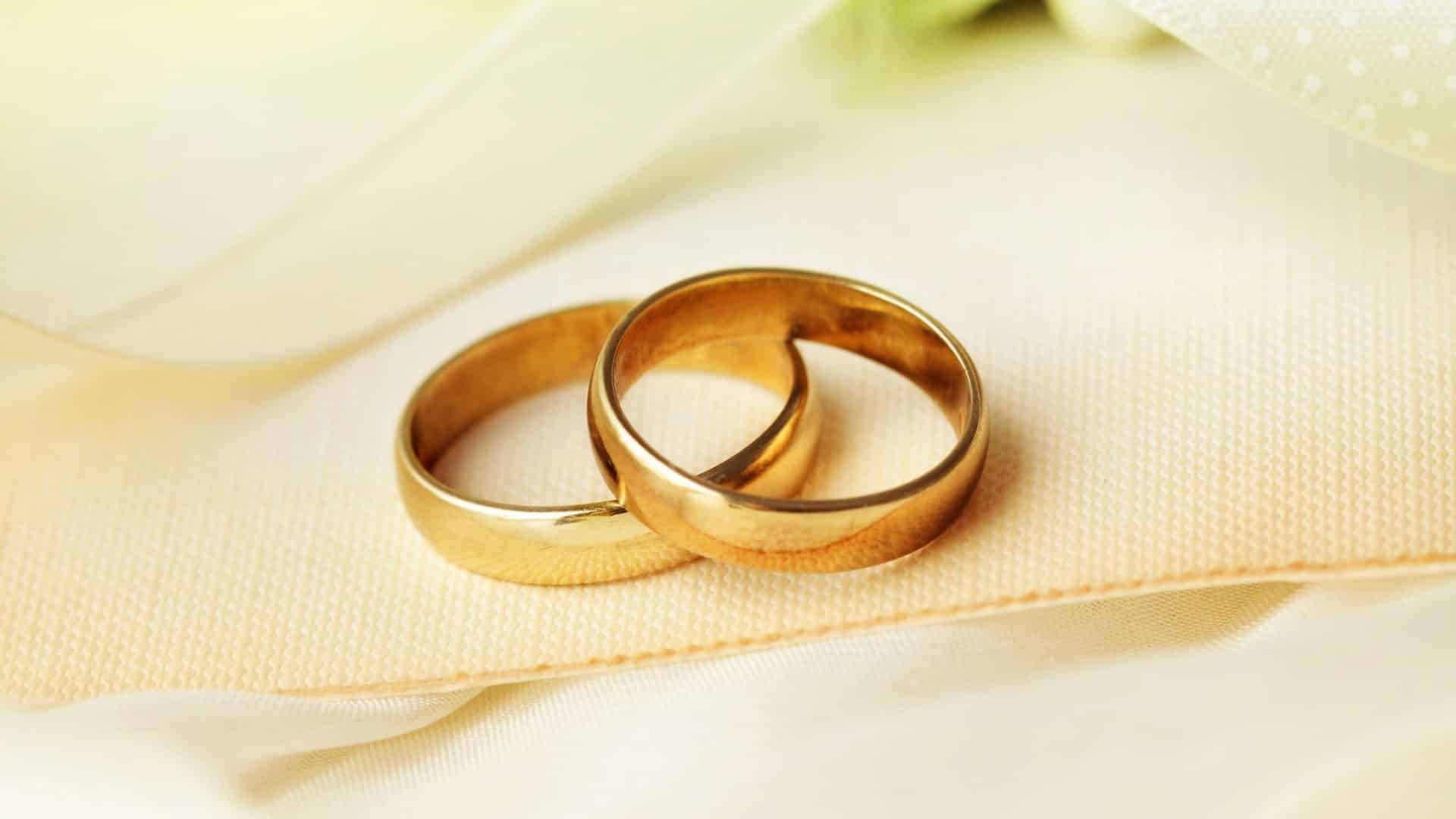 Close up view of two gold wedding bands