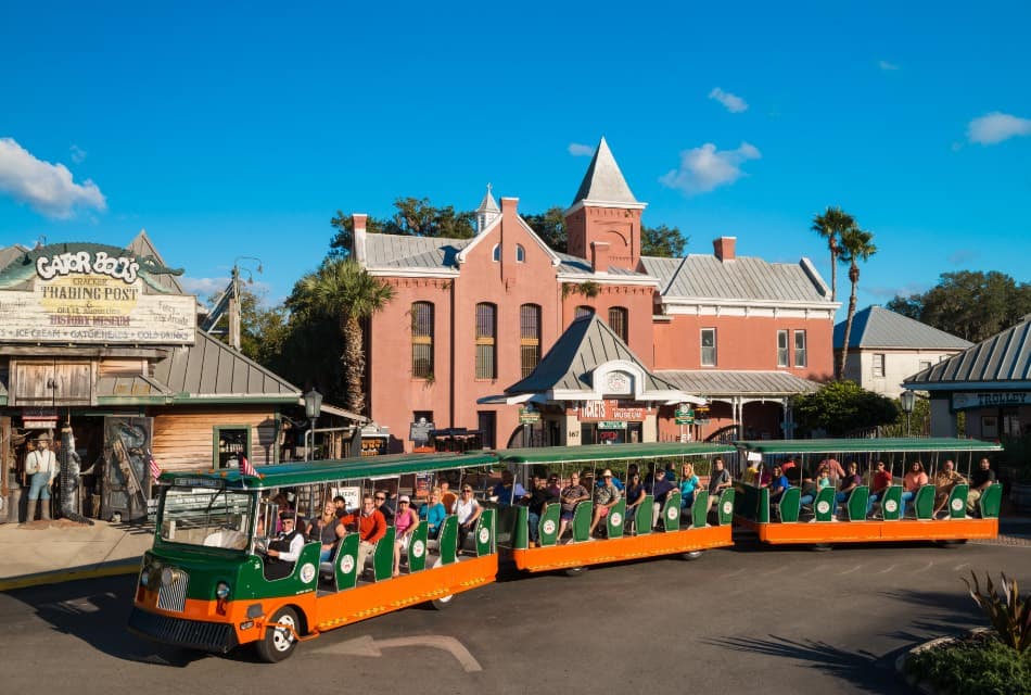 White text stating Old Town Trolley Tours on a green background